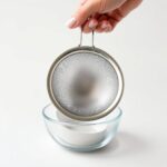 Fine mesh strainer for straining the sauce